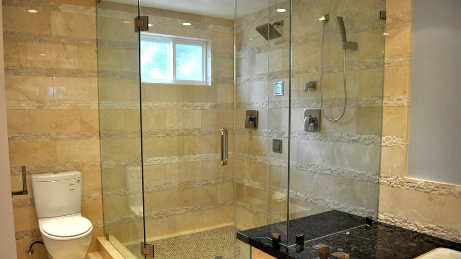A frameless shower door lets the sun provide natural light in your bathroom