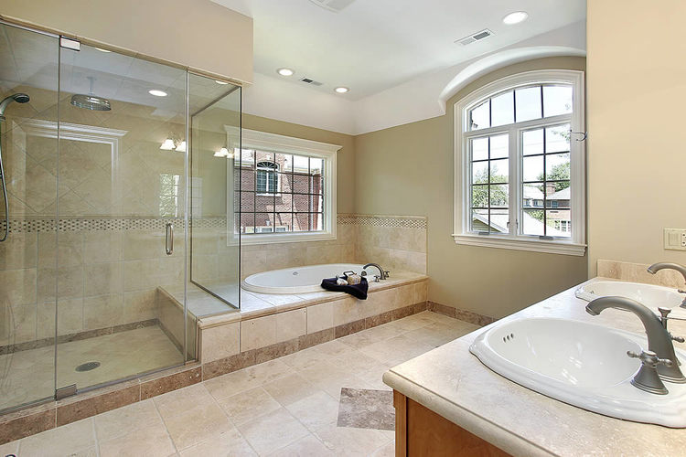 modern bathroom with frameless glass shower enclosure